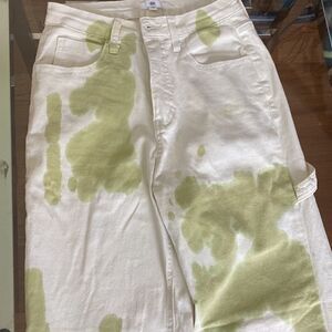 Cream with green tie-dye painter, pants jeans. High waisted, wide leg size 26.